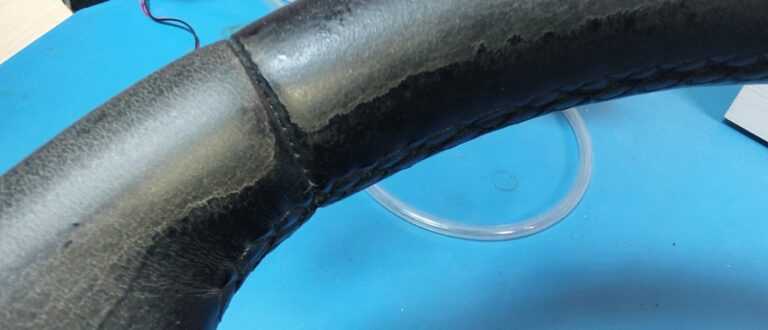bmw f10 steering wheel worn out damge close up 2